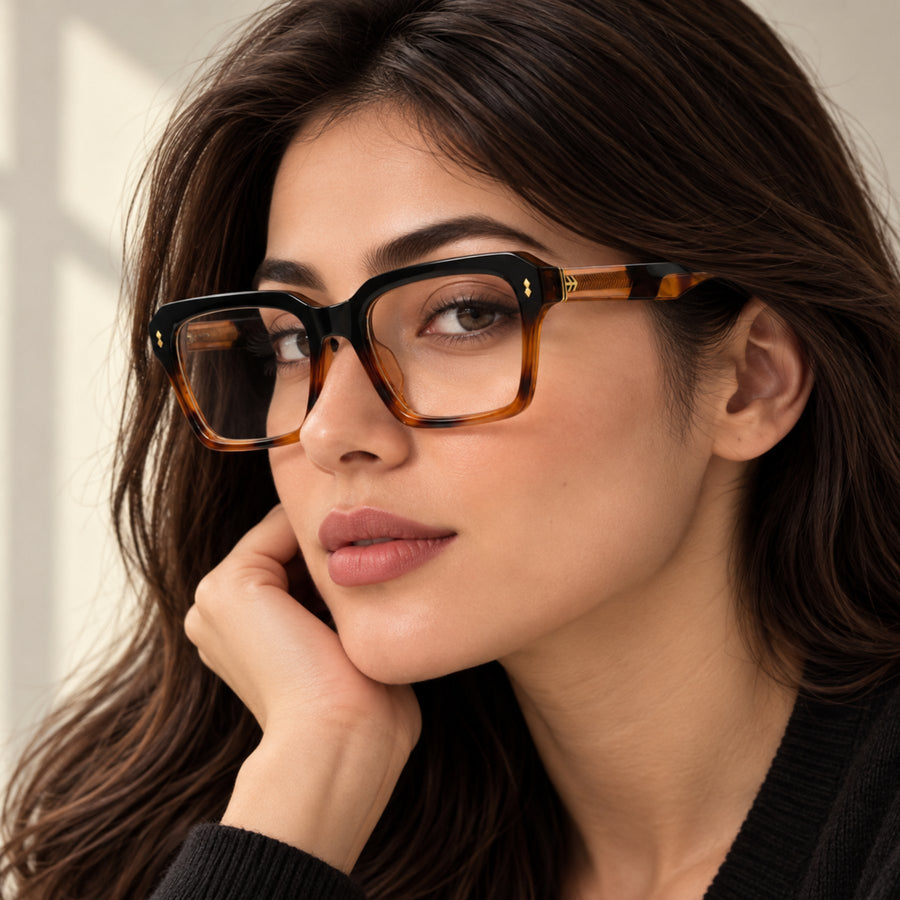 Woman wearing VERLIN 6233 Amber Tortoise bold square eyeglasses