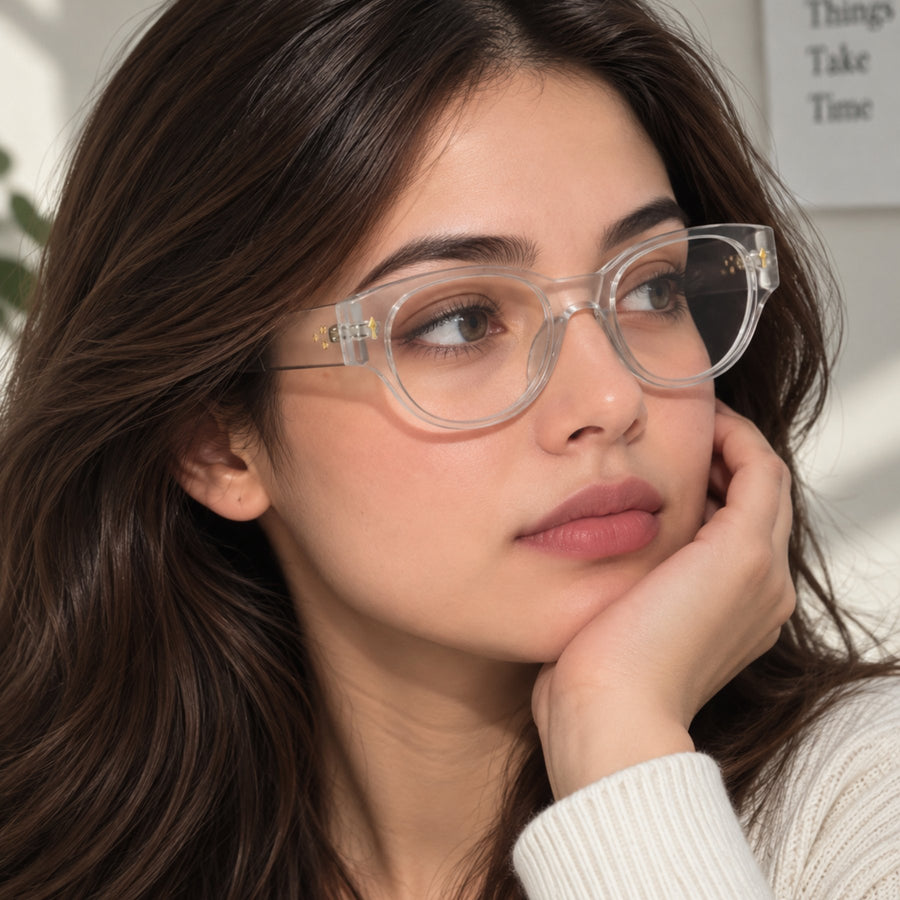 Model wearing 86309 VERLIN Oval Optical Frame in Clear Crystal