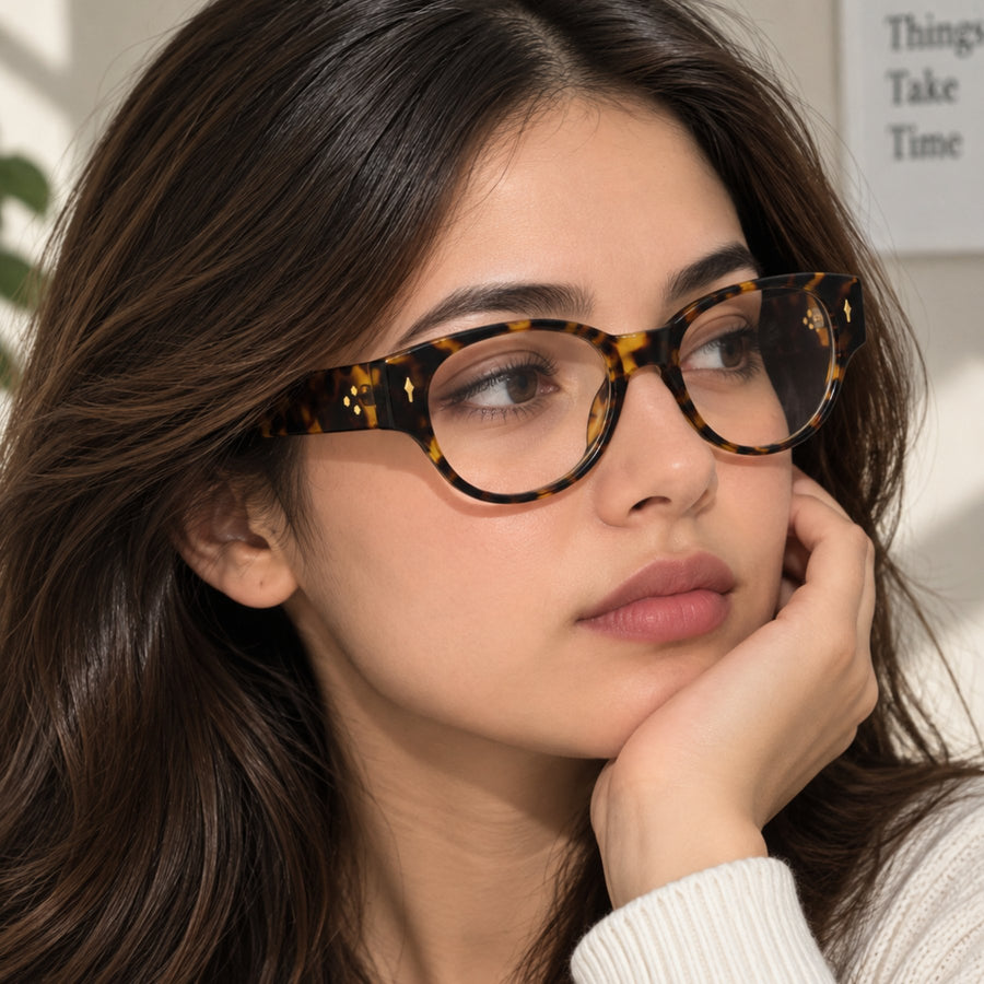 Model wearing 86309 VERLIN Oval Optical Frame in Tortoise