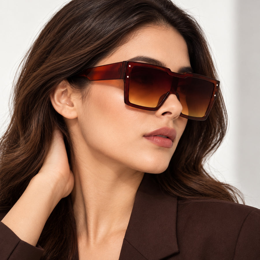 Model wearing Punch Dragon VERLIN Flat Top Sunglasses in Brown